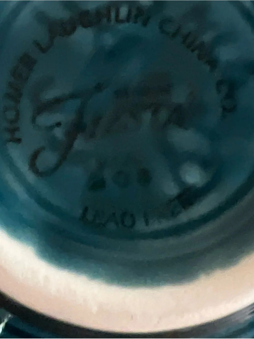Fiesta tea cup and saucer set in the retired Juniper green color year stamp 2000